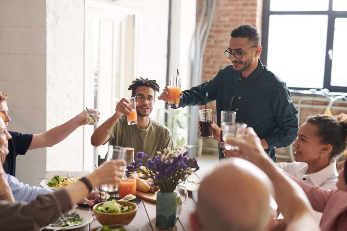 Friends raising a toast at a birthday meal